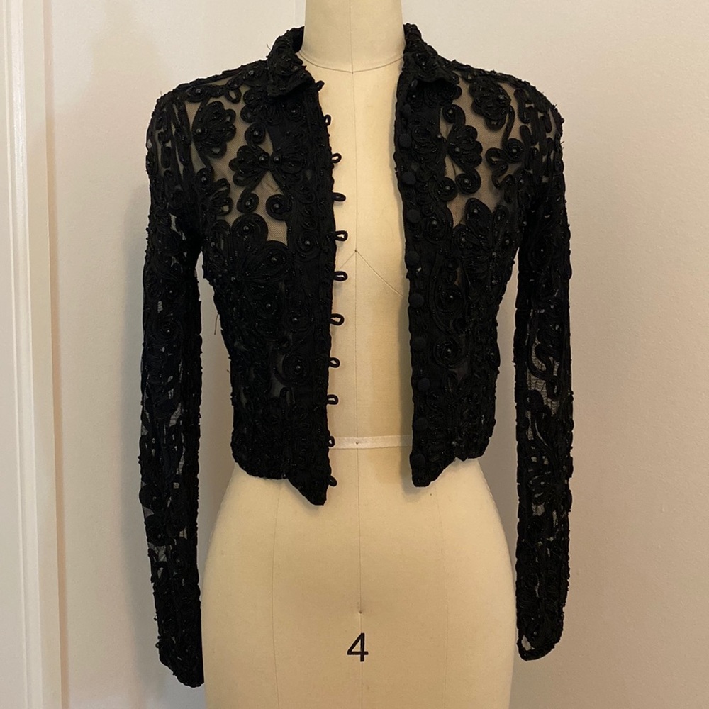 Bebe black ribbon embroidered bolero jacket with beading.